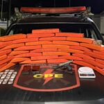 Maconha, pistola e munições apreendidas durante ação policial em Morrinhos. Foto: Polícia Militar